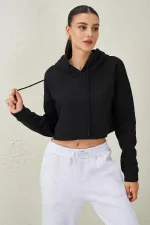 Sweat-shirt court à capuche noir pour femme avec coutures sales