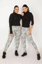 WOMEN'S BLACK ZEBRA PATTERNED LEGGINGS