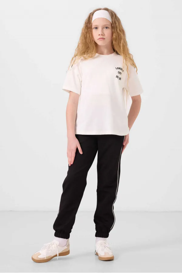 Tommylife Toptan O Yaka Baskılı Lastik Paçalı Standart Fit Kız Çocuk Eşofman Takım 75186 Ekru Siyah Tommylife Toptan O Yaka Baskılı Lastik Paçalı Standart Fit Kız Çocuk Eşofman Takım 75186 Ekru Siyah
